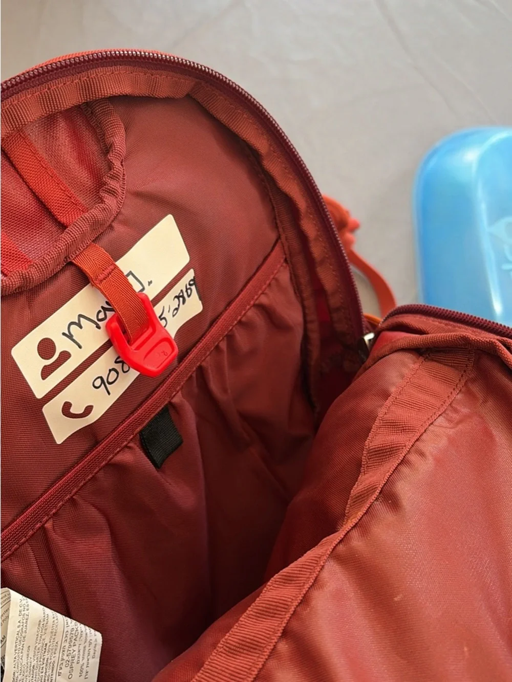 OSPREY Kids Daylite Jr Daypack in Bright Orange with Blue Hydration Reservoir